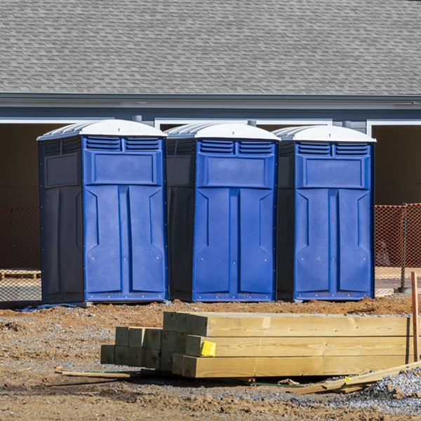 how often are the portable restrooms cleaned and serviced during a rental period in Oatman